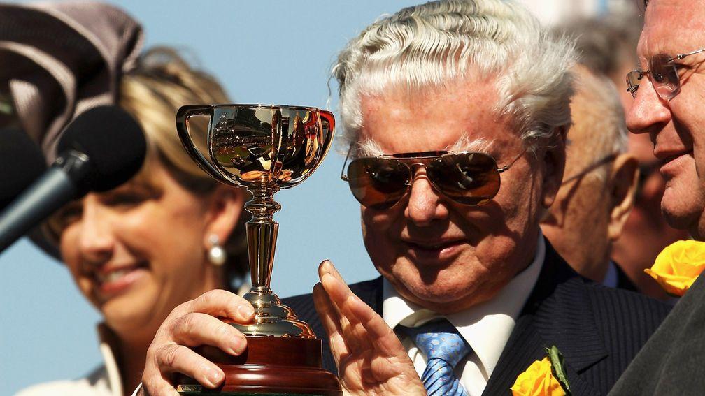 MELBOURNE, AUSTRALIA - NOVEMBER 04:  Bart Cummings, trainer of Viewed is presented with the trophy after winning the 2008 Emirates Melbourne Cup during The Melbourne Cup Carnival meeting at Flemington Racecourse on November 4, 2008 in Melbourne, Australia