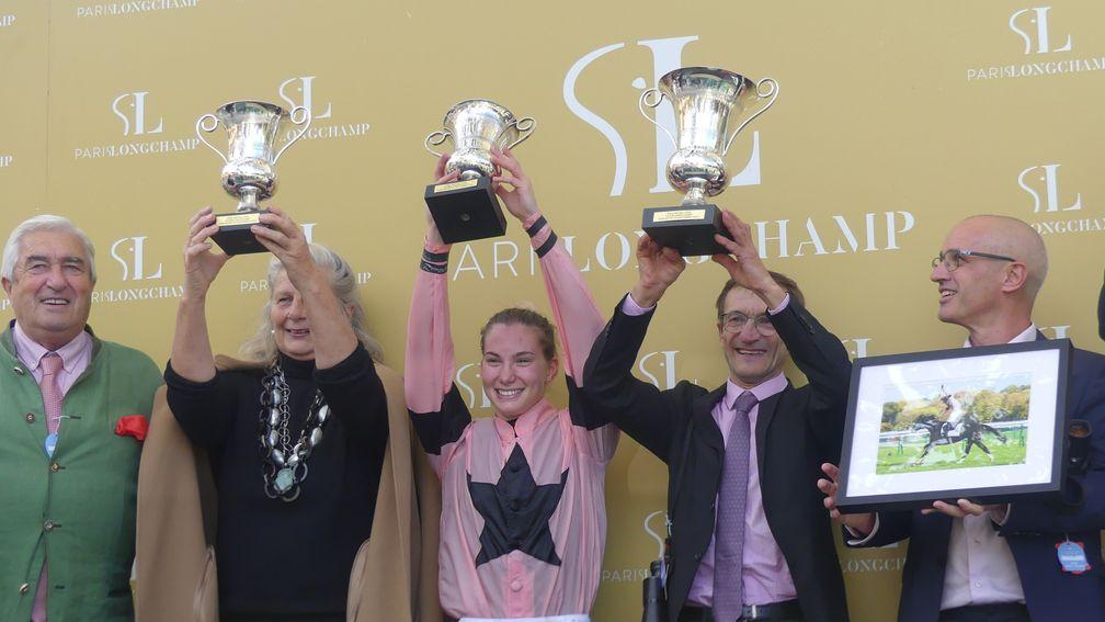 Jockey Marie Velon and trainer Jean-Pierre Gauvin (second from right) savour victory with Iresine in the Group 1 Prix Royal-Oak