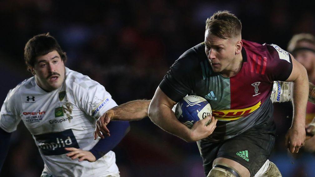 Alex Dombrandt of Harlequins breaks away with the ball against Clermont