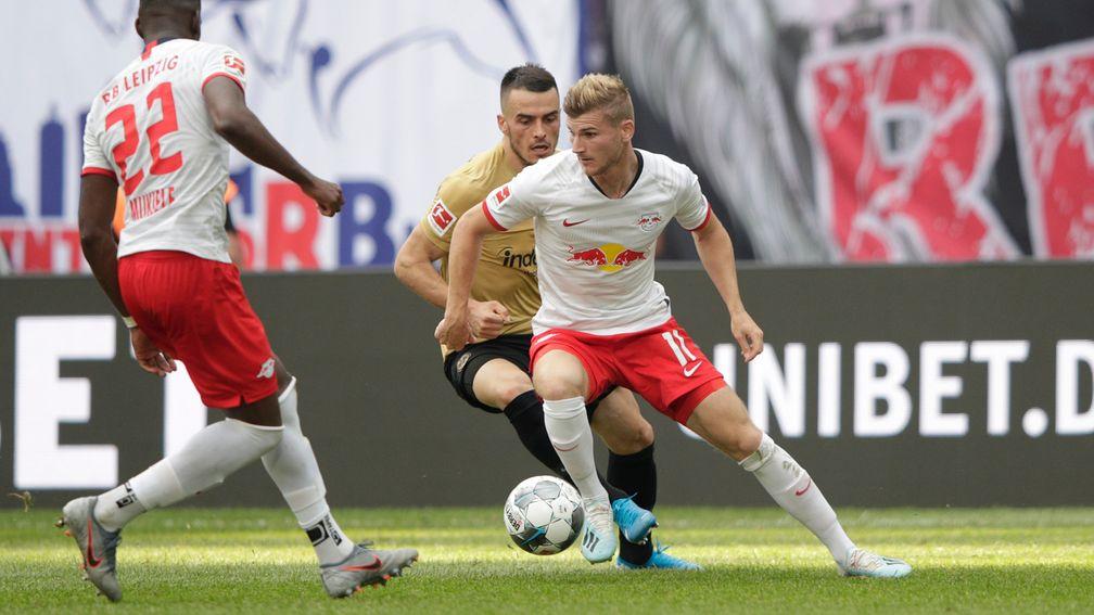 Timo Werner of RB Leipzig battles for possession with Filip Kostic of Eintracht Frankfurt