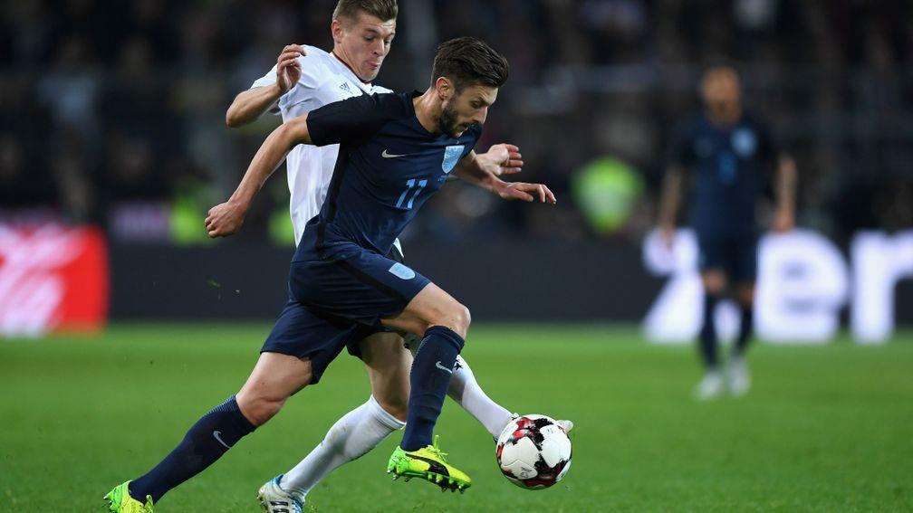 England's Adam Lallana takes on Toni Kroos of Germany