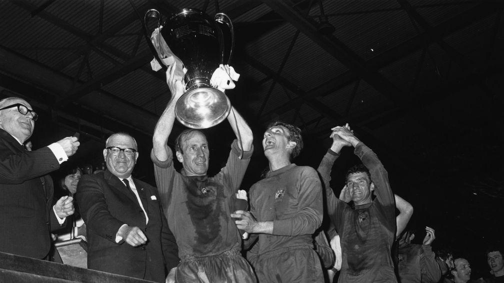 Bobby Charlton lifts the European Cup after Manchester United's famous victory at Wembley