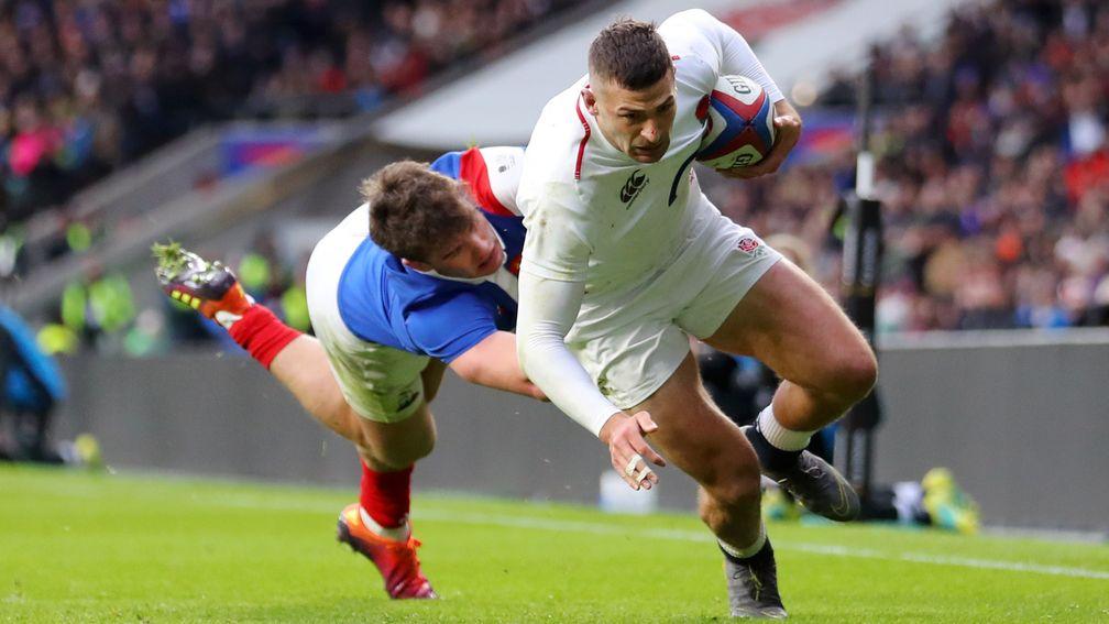 England winger Jonny May scores the second of this three tries against France