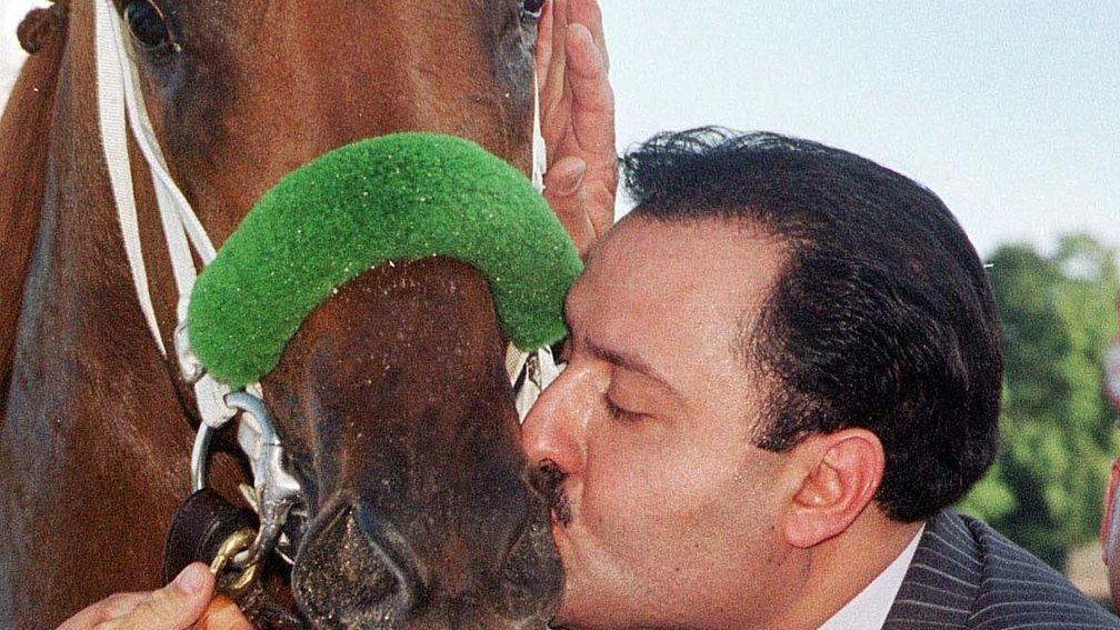 Prince Ahmed Salman kisses Point Given after winning the 2001 Travers Stakes at Saratoga