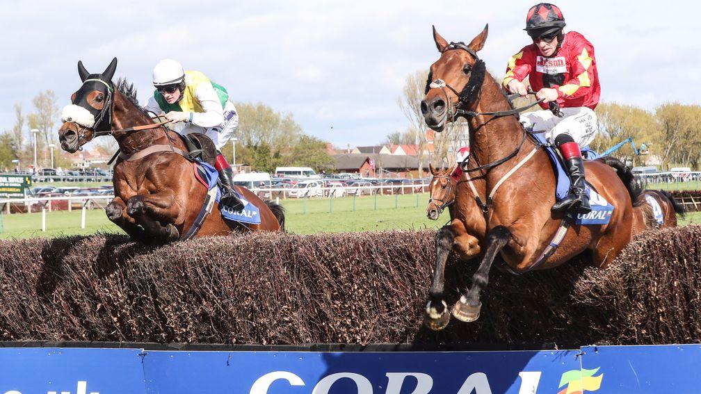 Vicente (left) top performance to pick himself off the Aintree turf to repeat his win in the Coral Scottish Grand National at Ayr on Saturday