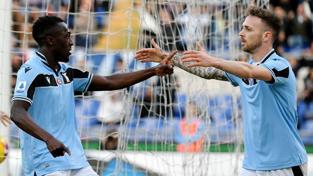 Bobby Adekanye (left) of Lazio celebrates