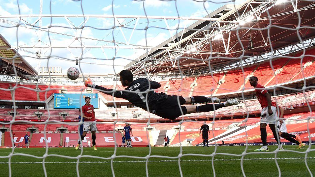 David De Gea of Manchester United makes a diving save against Chelsea at Wembley