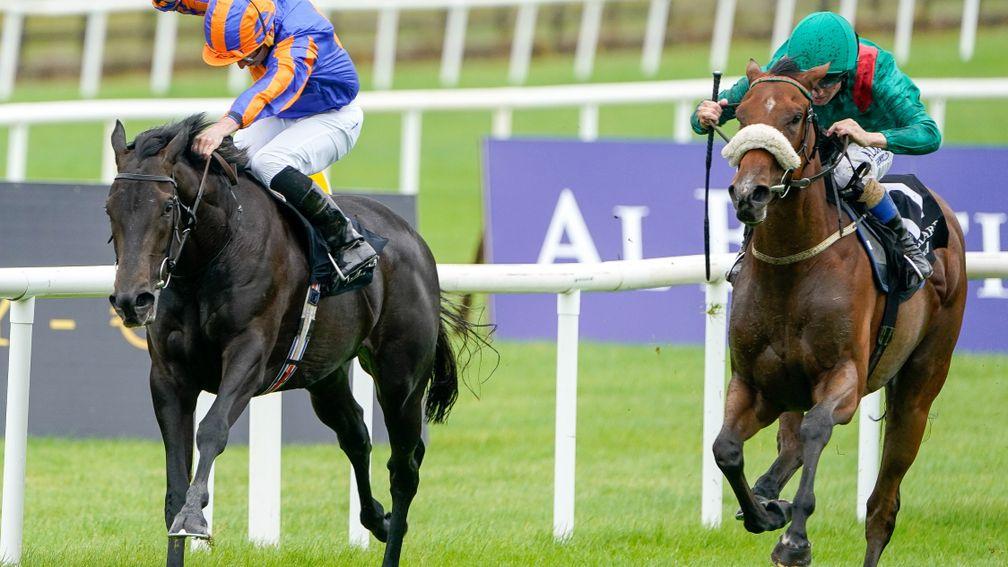 KILDARE, IRELAND - SEPTEMBER 11: Chris Hayes riding Tahiyra (green) win The Moyglare Stud Stakes at Curragh Racecourse on September 11, 2022 in Kildare, Ireland. (Photo by Alan Crowhurst/Getty Images)