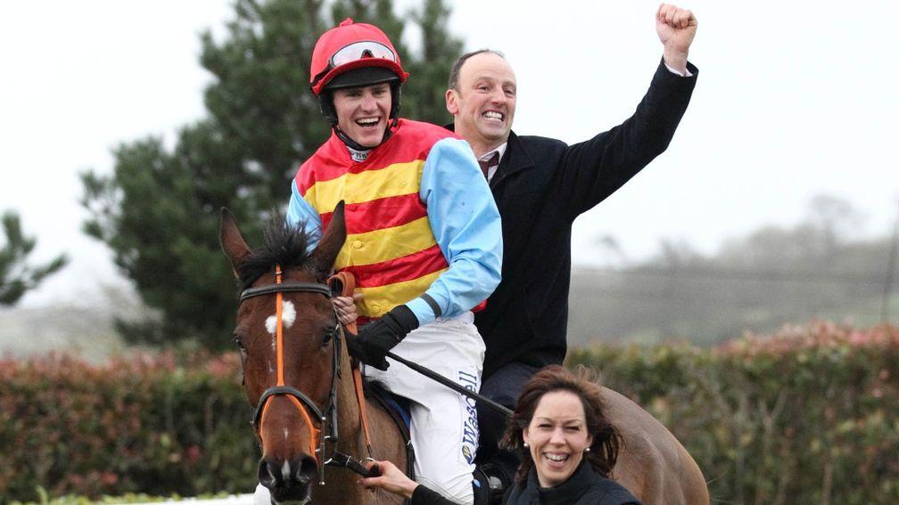 Two's a crowd: Anthony Knott rides tandem with Nick Scholfield after Hunt Ball wins at Wincanton