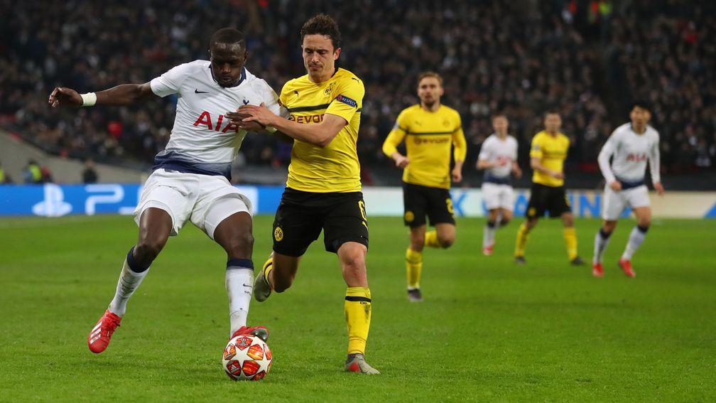 Tottenham's Moussa Sissoko battles with Thomas Delaney of Dortmund the Champions League Round of 16