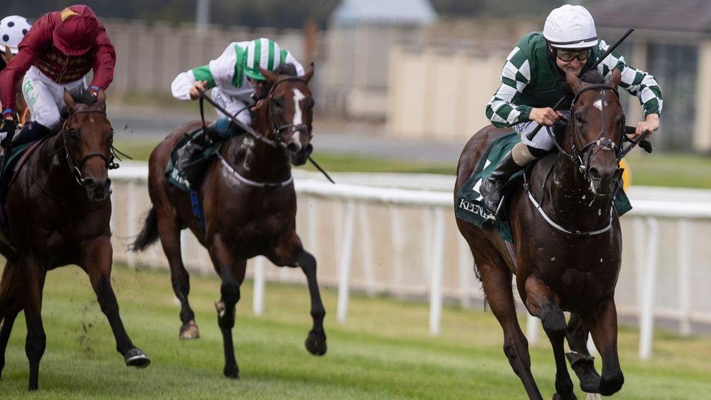 Lucky Vega (right) charges home in the Phoenix Stakes under Shane Foley