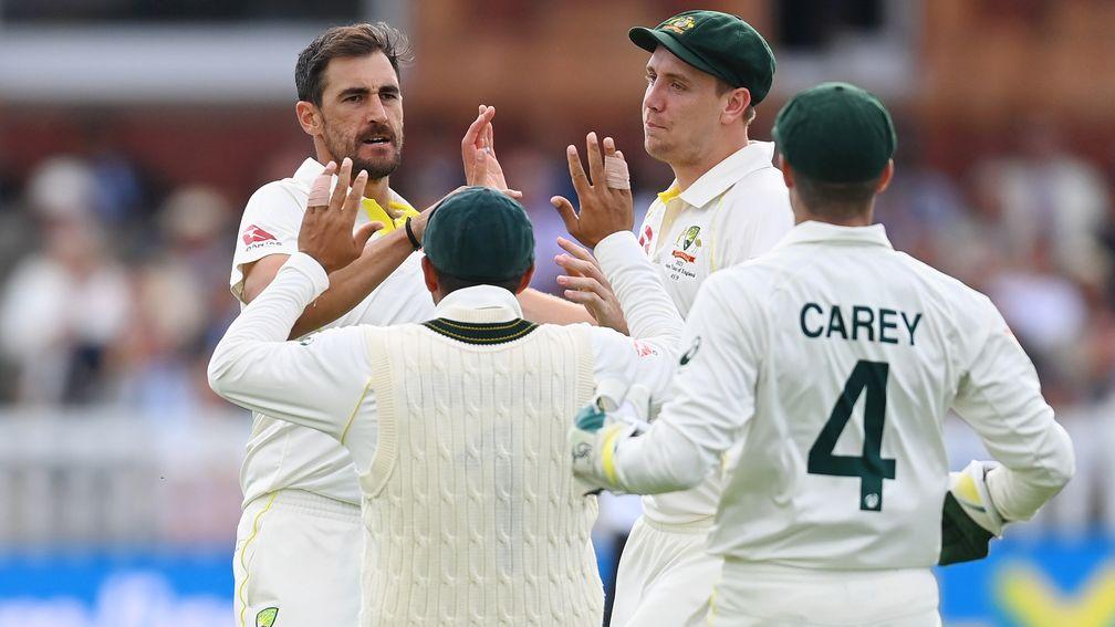 Australia celebrate one of Mitchell Starc's six wickets in the win at Lord's