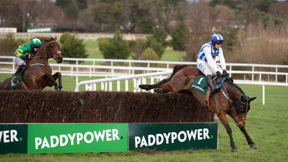 Castlebawn West clears the last under Paul Townend to land an all-the-way victory from runner-up Minella Times (left) in the Paddy Power Chase at Leopardstown