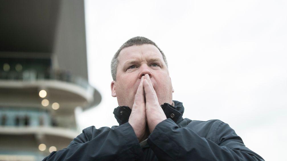 Gordon Elliott watches the Cross Country race, won by the trainer’s Tiger Roll – already the winner of the Triumph Hurdle and National Hunt Chase in previous years