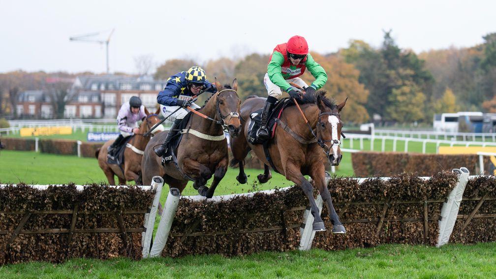 Henri The Second (Harry Cobden,right) jumps the final flight and beats Henry's Friend (Kielan Woods) in the Winter Novices' HurdleSandown 2.12.22 Pic: Edward Whitaker