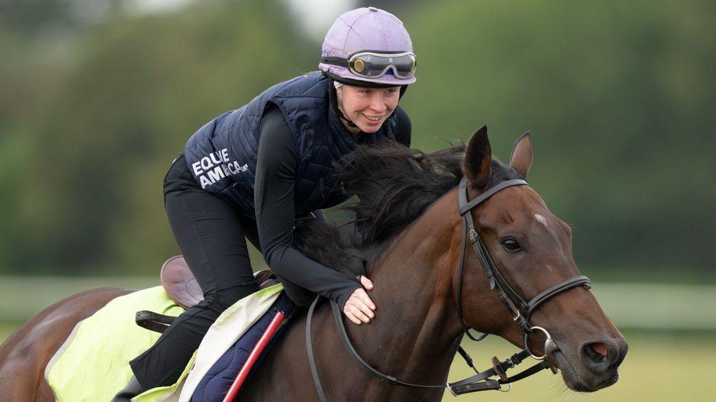 Rosie Margarson and Caribbean Spring (Bean) enjoy a routine exercise up Long Hill in Newmarket
