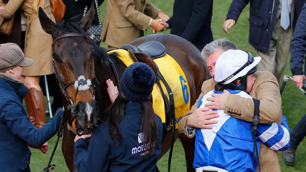 Paul Nicholls embraces Bryony Frost after Frodon's success