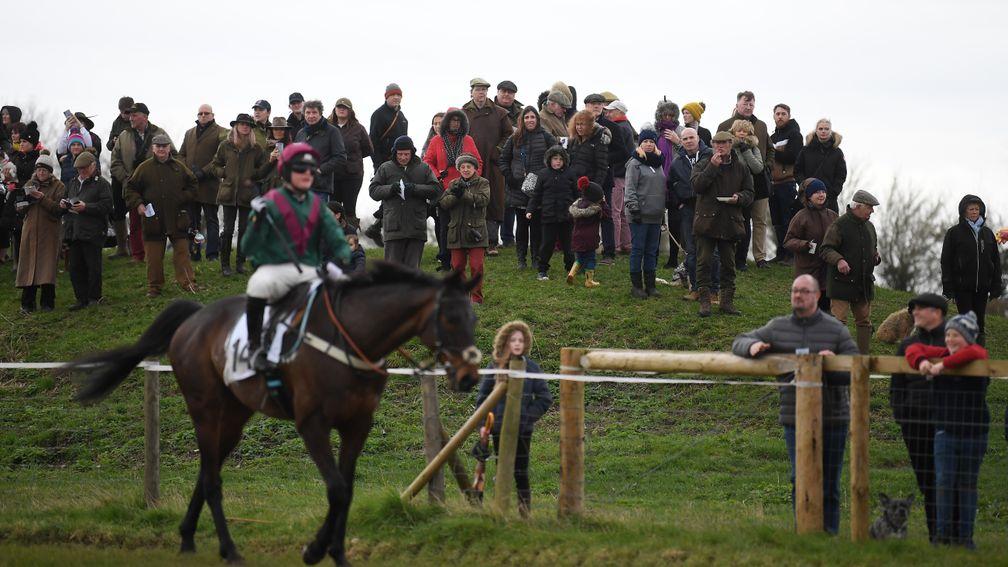 The crowd look on during a point-to-point meeting at High Easter in Essex