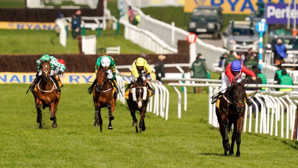 CHELTENHAM, ENGLAND - MARCH 18: Rachael Blackmore riding Allaho (red) clear the last to win The Ryanair Chase at Cheltenham Racecourse on March 18, 2021 in Cheltenham, England. Sporting venues around the UK remain under strict restrictions due to the Coro