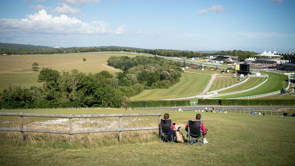 A small number of spectators watched Saturday's Glorious Goodwood action from Trundle Hill