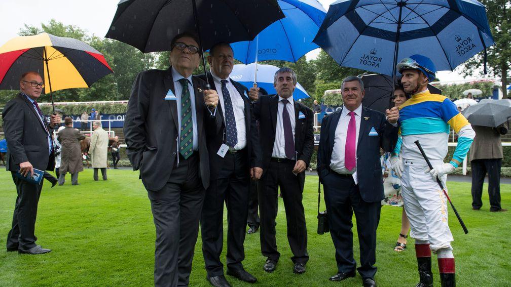 Alfredo Gaitan (second right) and jockey Gerald Mosse before the King George dream was ruined by rain