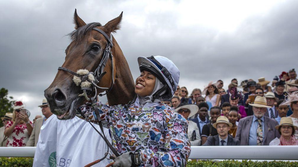 CHICHESTER, ENGLAND - AUGUST 01: Khadijah Mellah, 18, from Peckham celebrates after winning with her horse 'Haverland' in the charity race, the Magnolia Cup on August 01, 2019 in Chichester, England. Khadijah learnt to ride at the charity 'Ebony Horse Clu