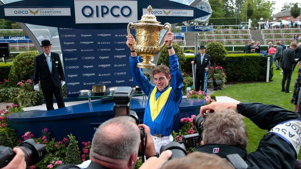 James Doyle holds up the trophy after winning with Poet's WordThe King George VI And Queen Elizabeth Stakes (Sponsored By Qipco) (Group 1) (British Champions Series)Ascot 28/7/2018©cranhamphoto.com