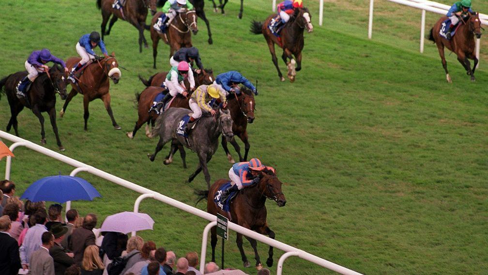 Mozart (bottom left) scorches a trail as he wins the July Cup in 2001