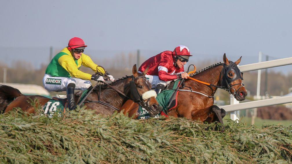 Tiger Roll and Magic Of Light jump the last together in Saturday's Grand National