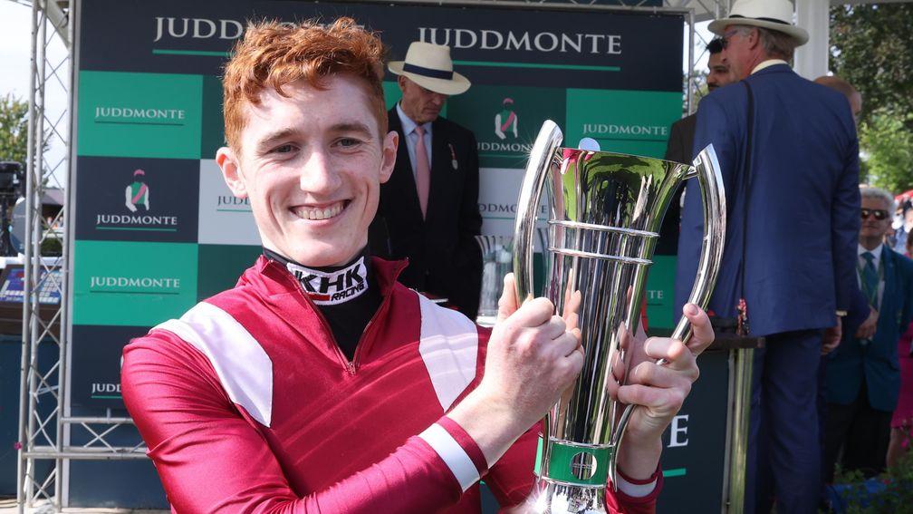 David Egan with his trophy after winning the Juddmonte International on Mishriff