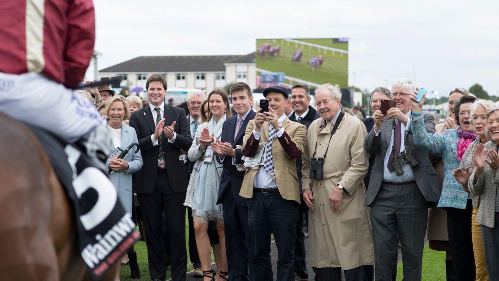 Sam Hoskins (second left): organises two successful syndicates