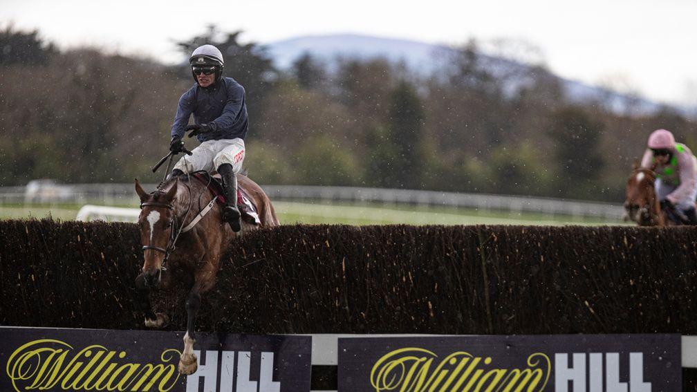 Colreevy and Danny Mullins clear the last in the Grade 1 Champion Novice Chase