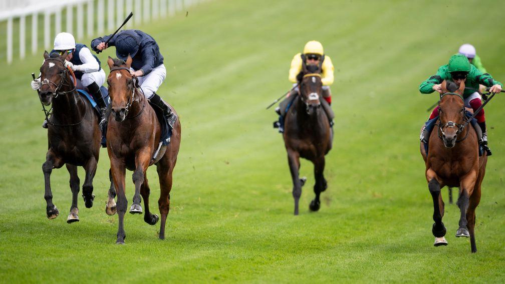 Cap Francais (left) chases home Cape Of Good Hope (dark colours) at Epsom