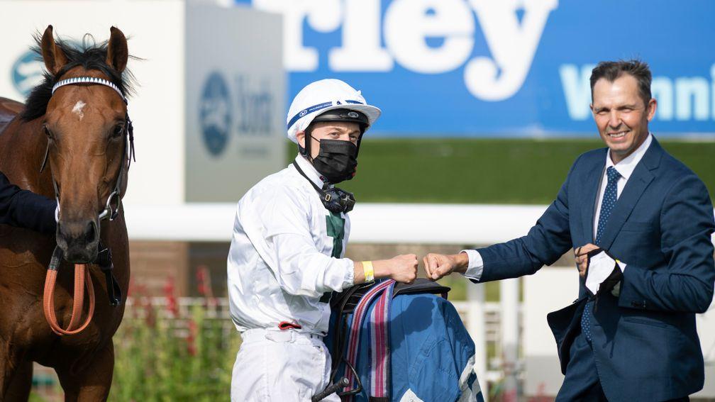 Trainer Terry Kent (right) and jockey Ray Dawson after winning the Sky Bet EBF Stallions Nursery Handicap Stakes with Ataser