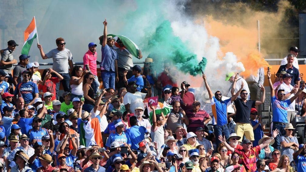 India fans celebrate their team's Twenty20 win over England in Bristol