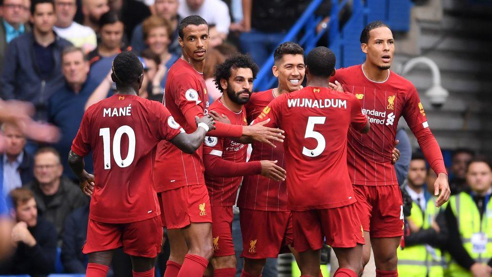 Liverpool celebrate Roberto Firmino's goal in their win at Chelsea