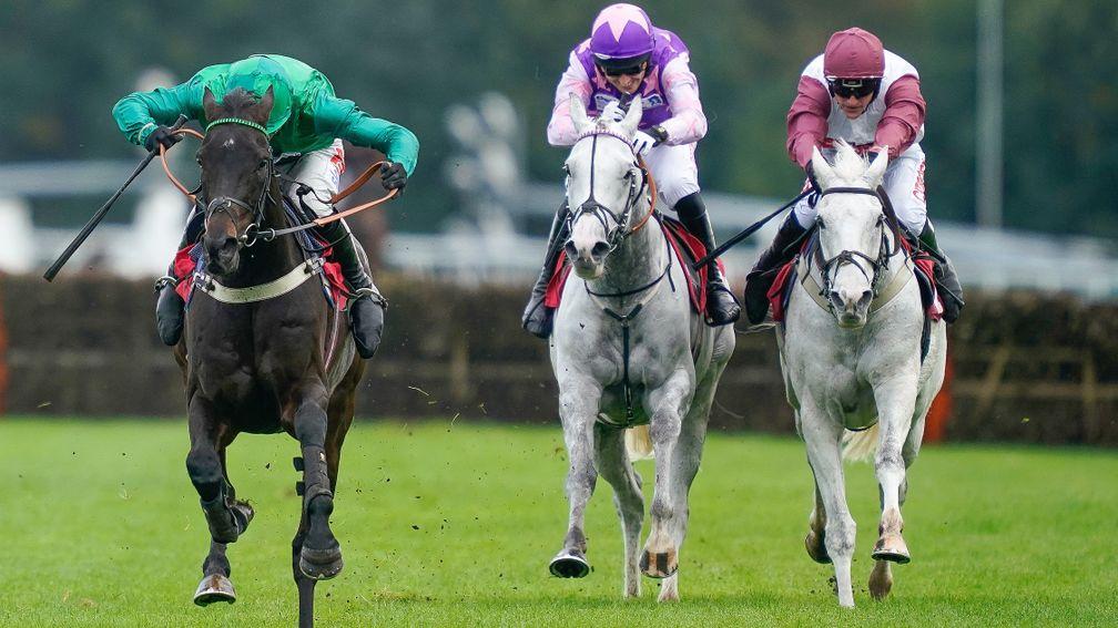 Sceau Royal (left) storms clear of Christmas Hurdle winner Silver Streak (right) and Teqany (centre)
