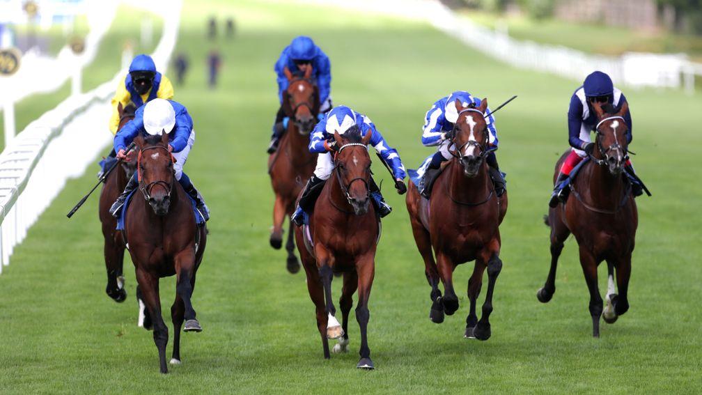 Magny Cours (left) lands the Listed Gala Stakes by a neck under William Buick