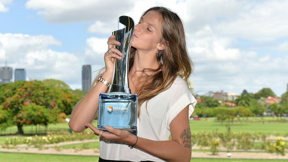 Karolina Pliskova kisses the the Brisbane International trophy