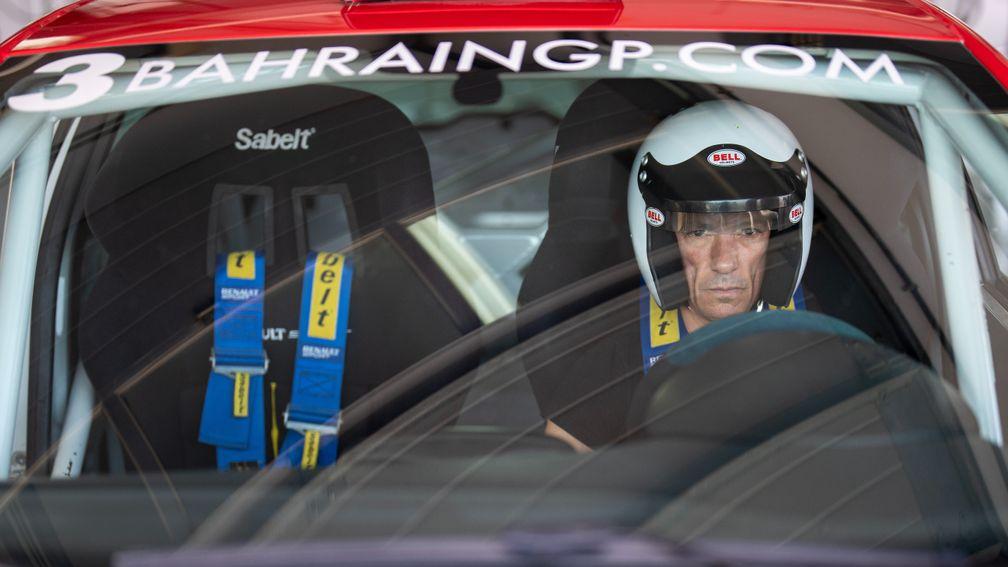 Frankie Dettori inthe cockpit of his Renault Clio RS before heading out to the short track of the Bahrain International Circuit , home of the Bahrain Grand PrixBahrain 17.11.22 Pic: Edward Whitaker