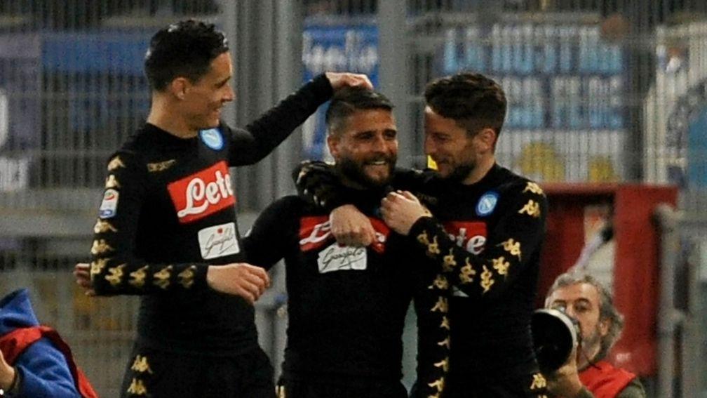 Lorenzo Insigne (centre) celebrates a goal with his Napoli teammates