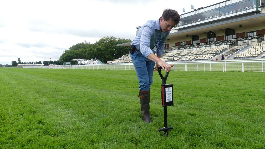 France Galop's Lucien de Colbert with the Turftrax GoingStick at Deauville racecourse