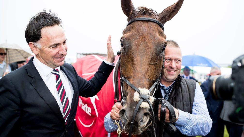 Henry de Bromhead gives Balko Des Flos a pat following his six-year-old's victory in the Galway Plate