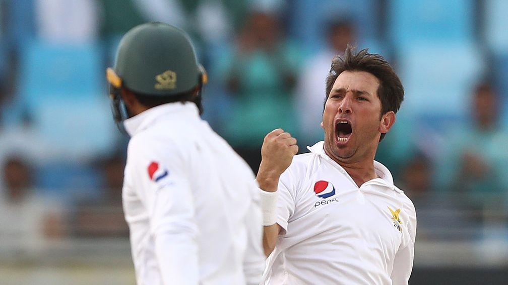 Yasir Shah of Pakistan celebrates after taking the wicket of Usman Khawaja of Australia