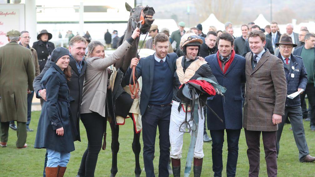 David Cottin (second from right, red scarf) and jockey Jonathan Plouganou with Easyland after winning the Glenfarclas Handicap at Cheltenham in December
