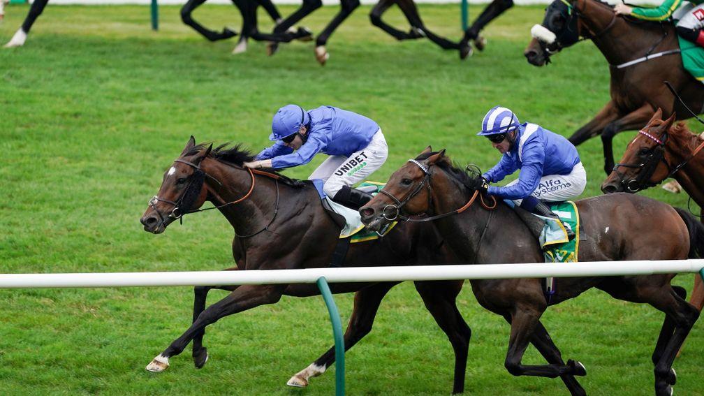 NEWMARKET, ENGLAND - SEPTEMBER 25: Jamie Spencer riding Bedouin's Story (L, blue) win The bet365 Cambridgeshire Handicap at Newmarket Racecourse on September 25, 2021 in Newmarket, England. (Photo by Alan Crowhurst/Getty Images)