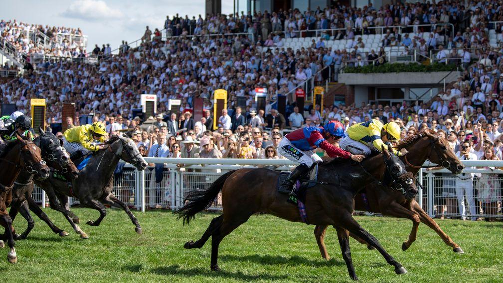 Gifted Master (Jason Watson, nearside) collars Justanotherbottle in a Unibet Stewards Cup run before a sell-out crowd