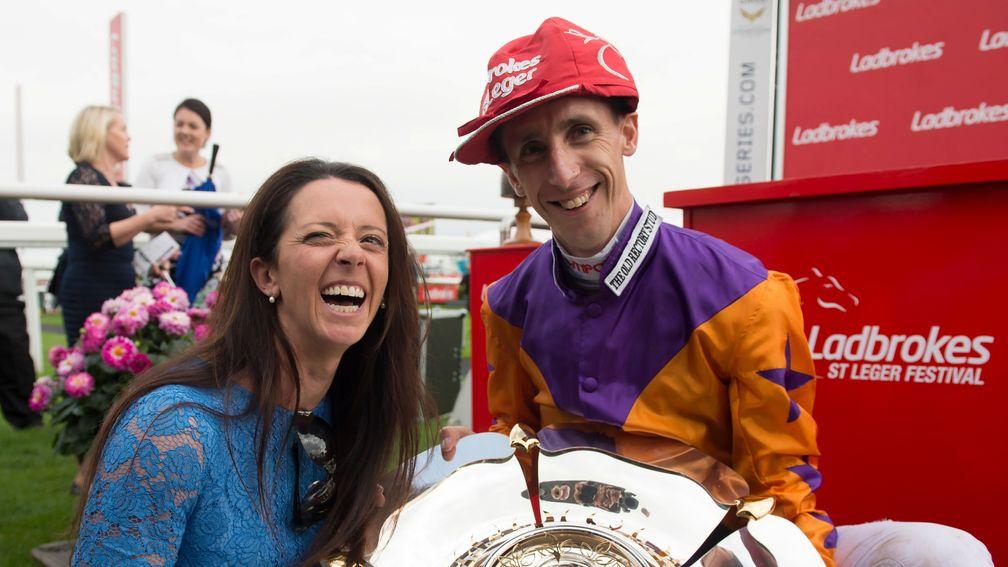 Laura Mongan and George Baker after winning the St Leger with Harbour Law
