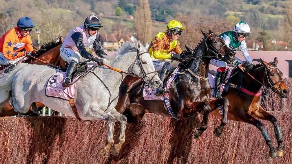 Galopin Des Champs (centre) jumps alongside L'Homme Presse (right) and Gentlemansgame in the Gold Cup