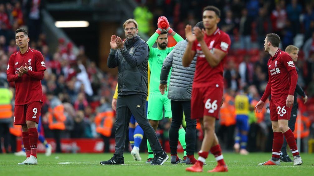 Jurgen Klopp, and Liverpool players applaud the Anfield crowd